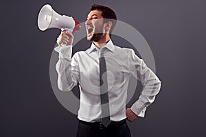 Shouting man using megaphone