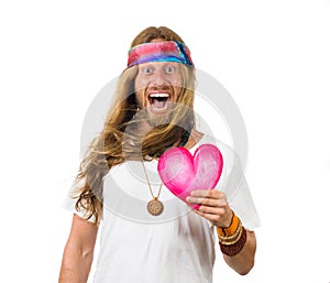 Shouting surprised hippie man holding a love heart