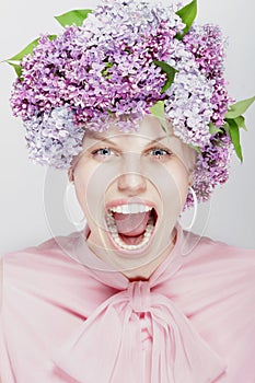 Shouting woman. Portrait of spring flowers.
