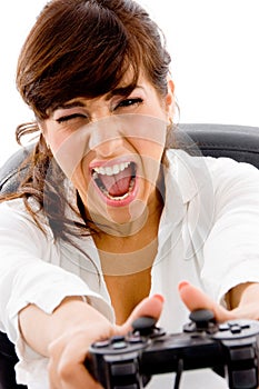Shouting woman pressing remote button