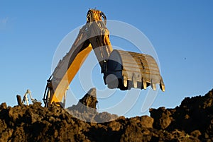 Shovel bucket against blue sky