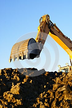 Shovel bucket against blue sky