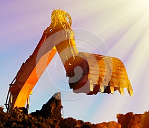 Shovel bucket against blue sky