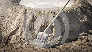 Shovel with a cement. Construction site