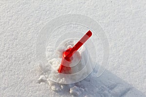 Shovel, covered snow