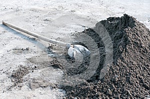 Shovel in dirt photo