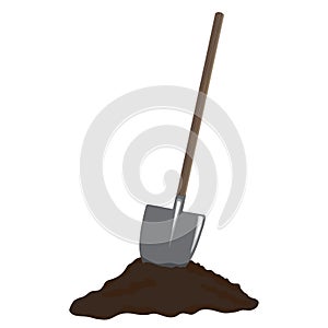 Shovel in heap of dirt