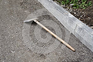 Shovel lying on the ground, repair, yard, new, construction