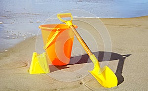 A Shovel and Pail on the Beach
