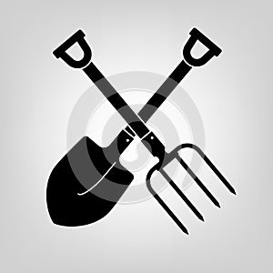 Shovel and pitchfork icon photo