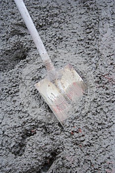 Shovel in Wet Concrete