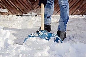 Shoveling snow in the backyard