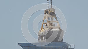 Shovels excavator machine depositing sand