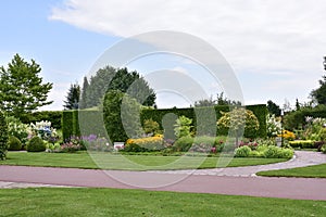 Show gardens, grass garden, summer garden, flower pots, gazebos, pond, flowers, molded plants.