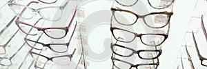 Showcase with glasses in optics salon closeup
