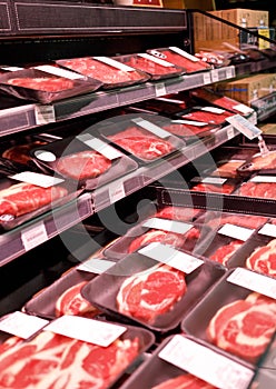 Showcase meat raw products in a supermarket