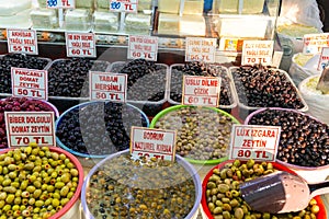 Showcase with olives and black olives at the market in Turkey