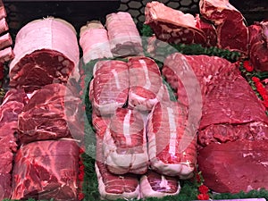 Showcase with raw meat in butcher shop, Supermarket