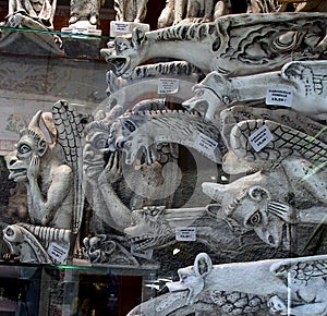 Showcase of souvenir shop with gypsum gargoyles in the fortress Carcassonne