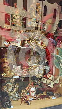 A showcase with Venetian masks, expensive carnival decorations, a souvenir from Venice