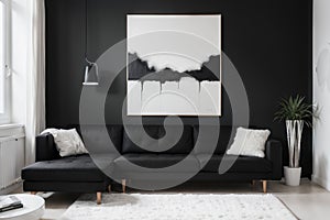 Black and white abstract painting on empty wall of cozy living room interior