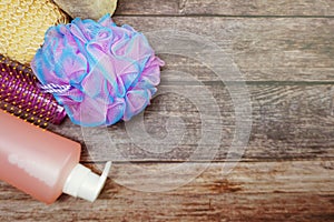 Shower accessories bath items on wooden background