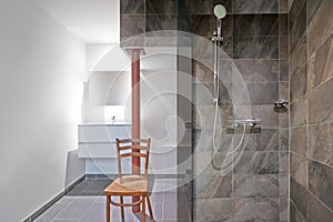 Shower bathroom with stone tile in washroom
