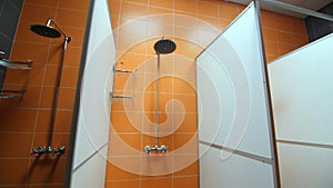 Shower cabins with shelves in contemporary sports complex