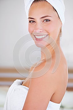 Shower fresh. Portrait of a woman during her morning beauty routine.