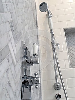 Shower marble floor herringbone pattern