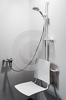 Shower with seat and grab bars for disabled and elderly people