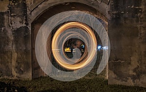 Showers of hot glowing sparks from spinning steel wool.