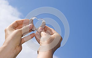 Showing a heart from hearing aids photo