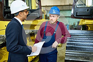 Showing Heavy Equipment to Customer