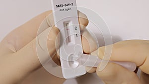 Showing a Sars Cov2 - Antigen Rapid Test with negative result - No Civid-19 photo