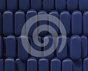 Seamless pattern of dark blue rounded rectangular with vertical ribbed texture arranged in a grid formation with subtle shadows