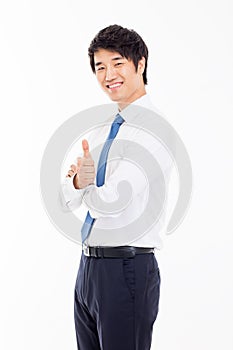 Showing thumb young Asian business man.