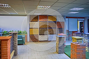 Showroom of Construction Materials Production Company With Equipment and Decorated Walls