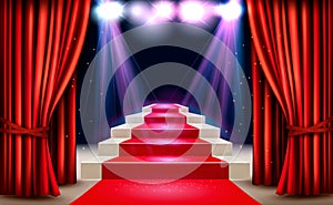 Showroom with red carpet leading to a podium and a spotlight. photo