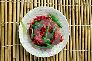 Shredded Beet and Carrot Salad.