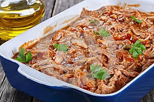 Shredded chicken meat tossed in sauce