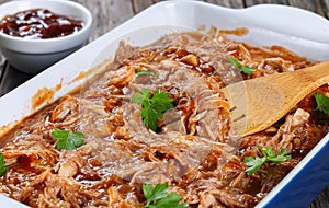 Shredded meat tossed in barbecue sauce