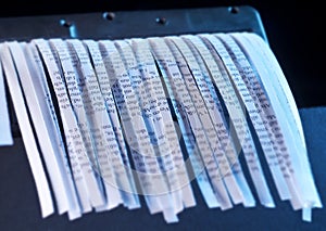 Shredder and paper strips