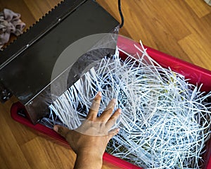 Shredding documents for security. Top view