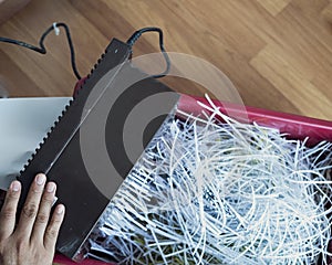 Shredding machine top view. Shredding documents for security