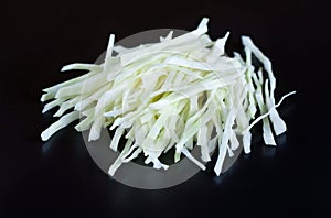 Shreds cabbage
