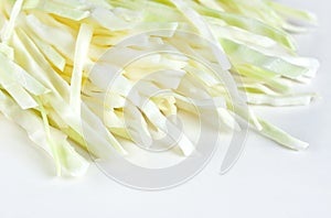 Shreds cabbage