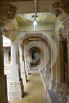 Shri Mahaveer Jain temple, circumambulation passage around sanctum sanctorum, inside Golden Fort, Jaisalmer, Rajasthan, India photo