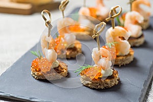 Shrimp Appetizer served on toasted bread