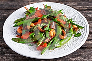 Shrimp and Asparagus stir fry food on white plate